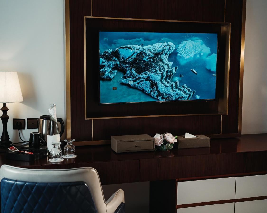 Waves Aqua Resort Kenitra Exterior foto A television in a hotel room